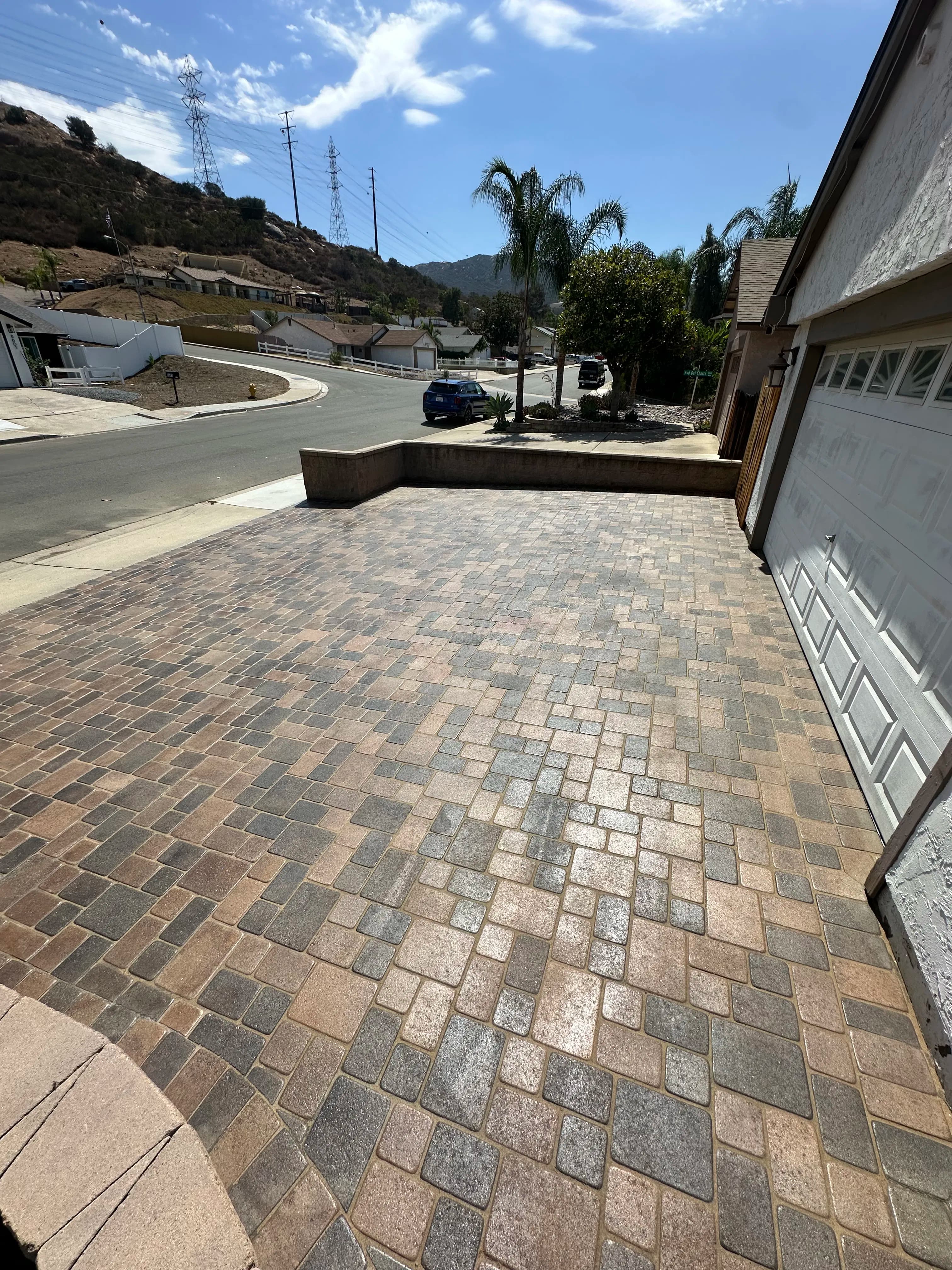 Project Paver Driveway Reset with Polymeric Sand and Fresh Seal image